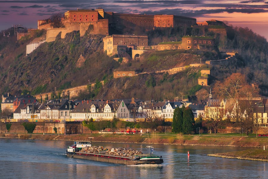 Ehrenbreitstein Fortress at sundown Rhine in the front of the picture.