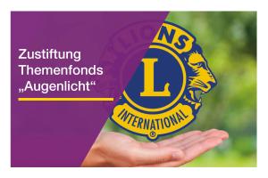 Eine Hand die unter einem Lions-Logo schwebt
