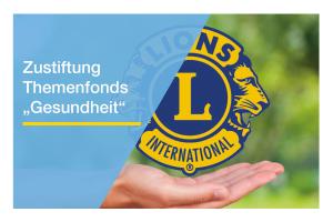Ein ausgestreckte Hand unter einem Lions Logo